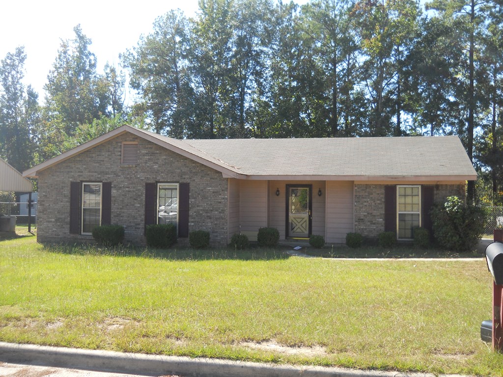 3075 Viking Drive Columbus, GA 31907 - Photo 2 of 4 a house view with swimming pool in front of it