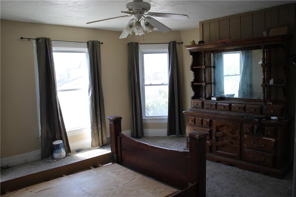 812 5th Street Rochester, PA 15074 - Photo 6 of 13 a living room with furniture and a window
