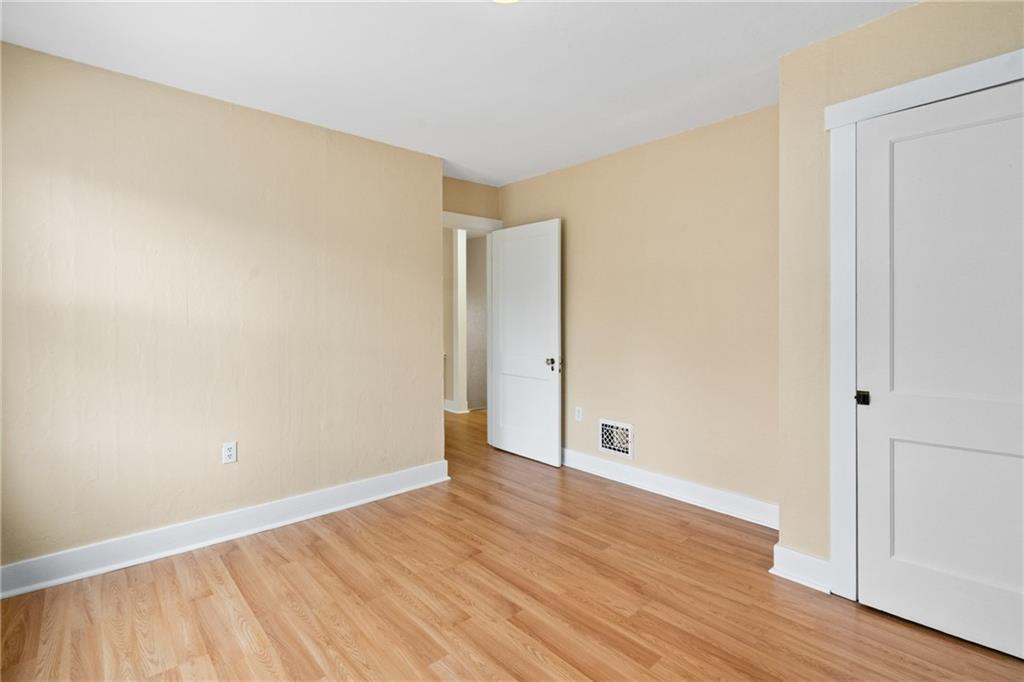 3612 Main Street Homestead, PA 15120 - Photo 19 of 30 a view of an empty room with wooden floor