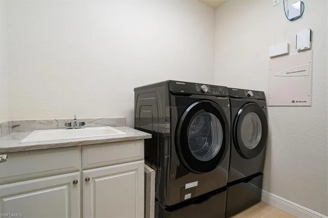 a view of a backyard with sitting area