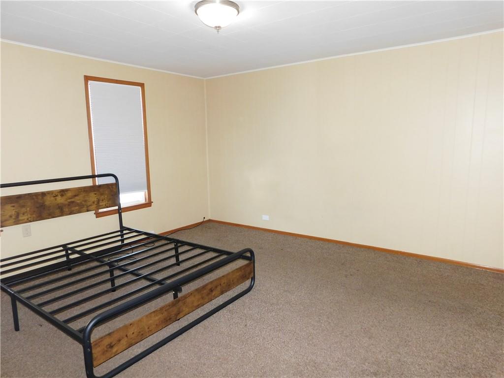 119 April Way Braddock, PA 15104 - Photo 7 of 16 a living room with a rug