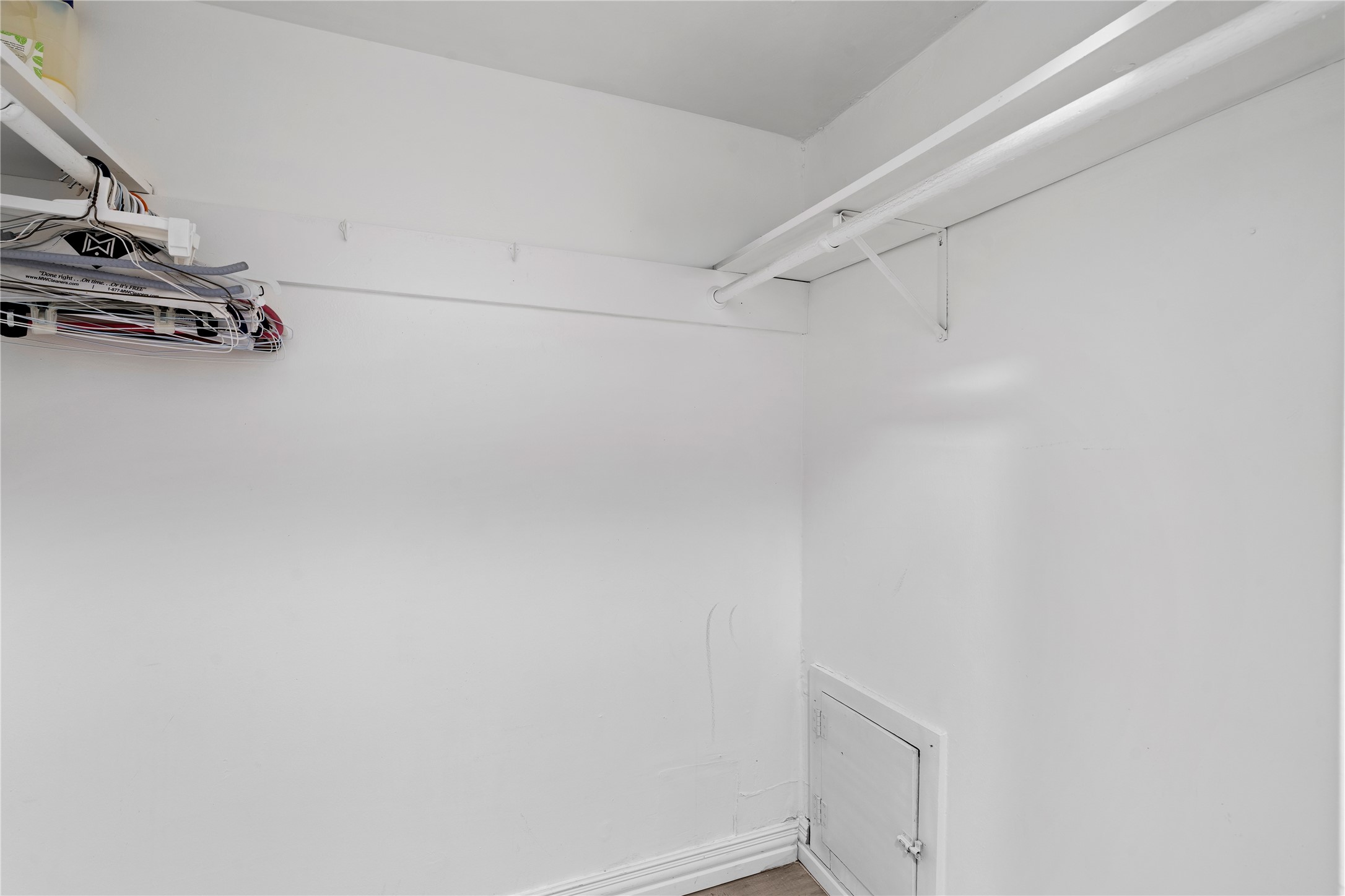 6303 Crab Orchard Road, Unit 3 Houston, TX 77057 - Photo 19 of 30 Even the storage is premium. This walk-in space features sturdy, built-in shelving and hanging rods, providing a "blank canvas" for your wardrobe. It's the kind of practical luxury that makes daily life feel organized and effortless.