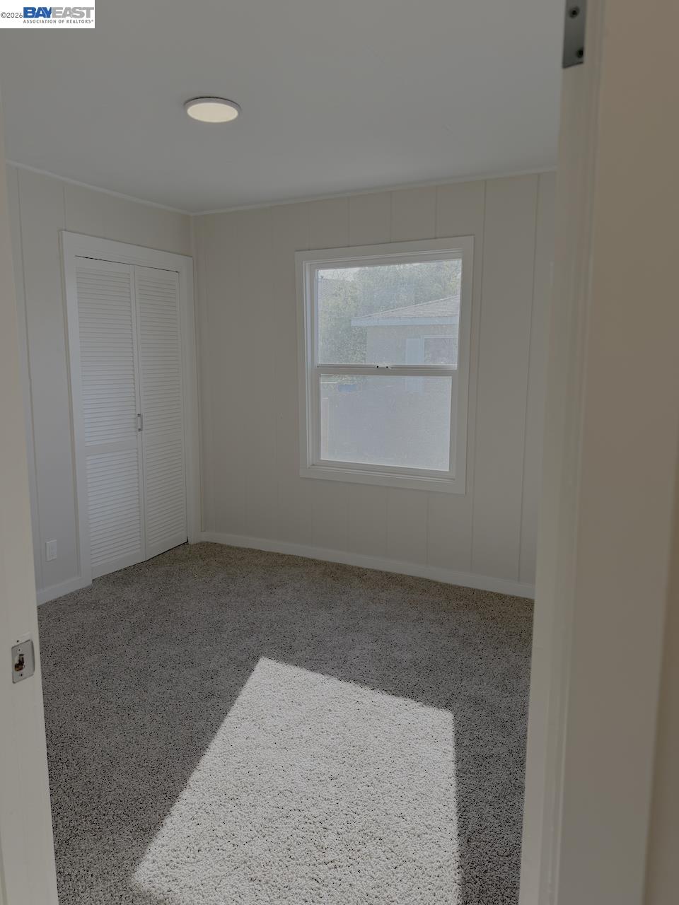 1324 Trenary Way Modesto, CA 95354 - Photo 13 of 17 an empty room with a window