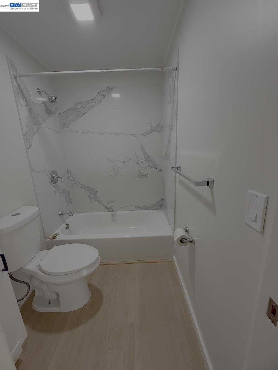 1324 Trenary Way Modesto, CA 95354 - Photo 15 of 17 a white toilet sitting next to a bath tub