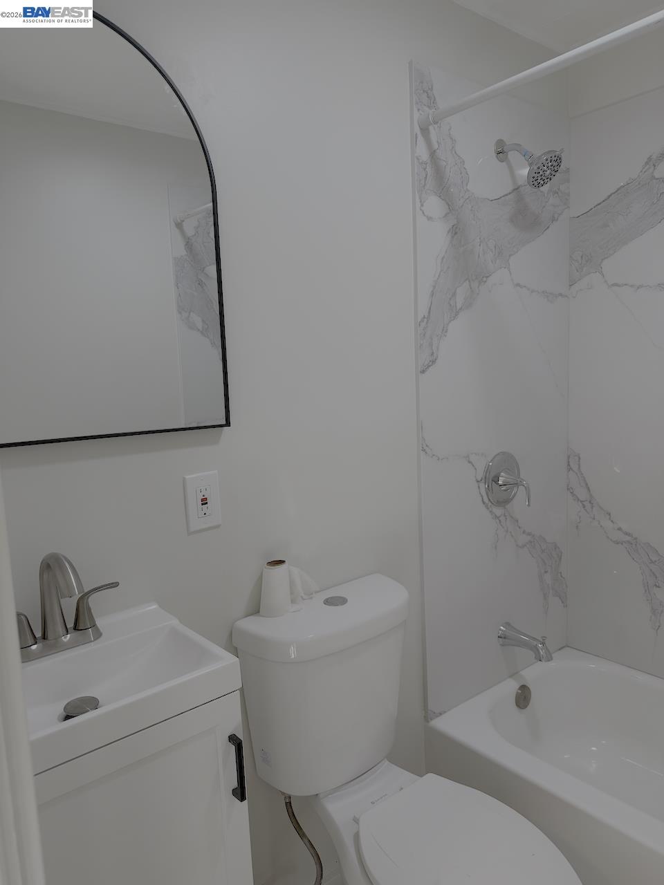 1324 Trenary Way Modesto, CA 95354 - Photo 17 of 17 a white toilet sitting next to a bathroom sink