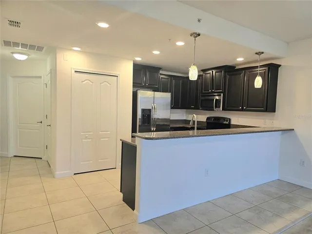 $235,000 | 8925 Azalea Sands Lane, Unit 602, Davenport, FL 33896