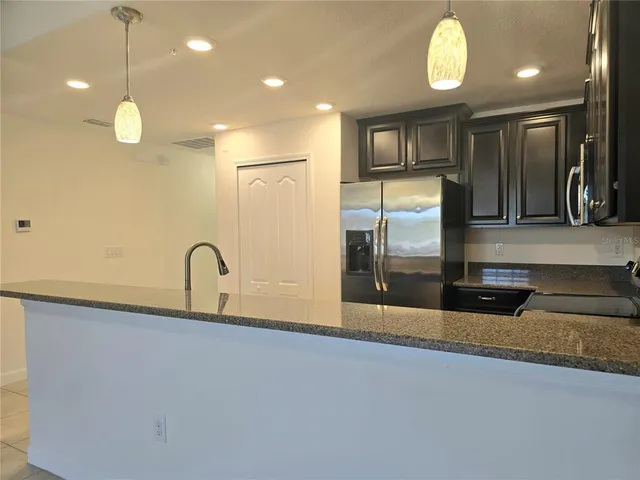 $235,000 | 8925 Azalea Sands Lane, Unit 602, Davenport, FL 33896