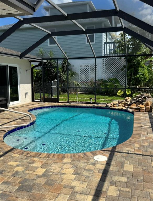 4385 7th Isle Drive Hernando Beach, FL 34607 - Photo 21 of 25 a view of a chairs and table in the patio