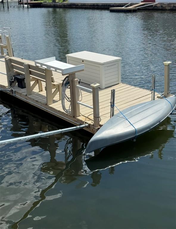 4385 7th Isle Drive Hernando Beach, FL 34607 - Photo 22 of 25 a terrace of a house with outdoor seating