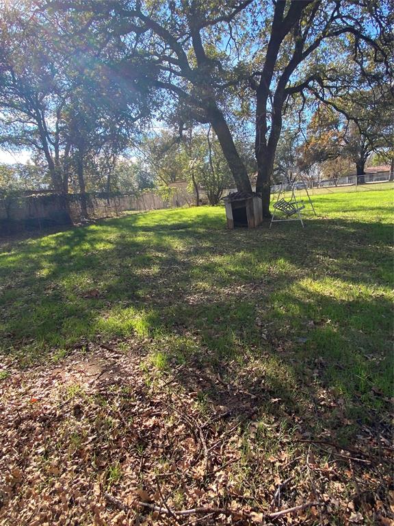 136 Richard Lane Azle, TX 76020 - Photo 12 of 13 a view of outdoor space with trees