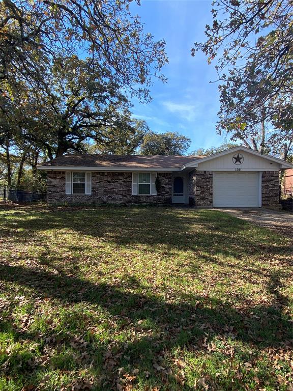 136 Richard Lane Azle, TX 76020 - Photo 2 of 13 a view of a house with a large pool