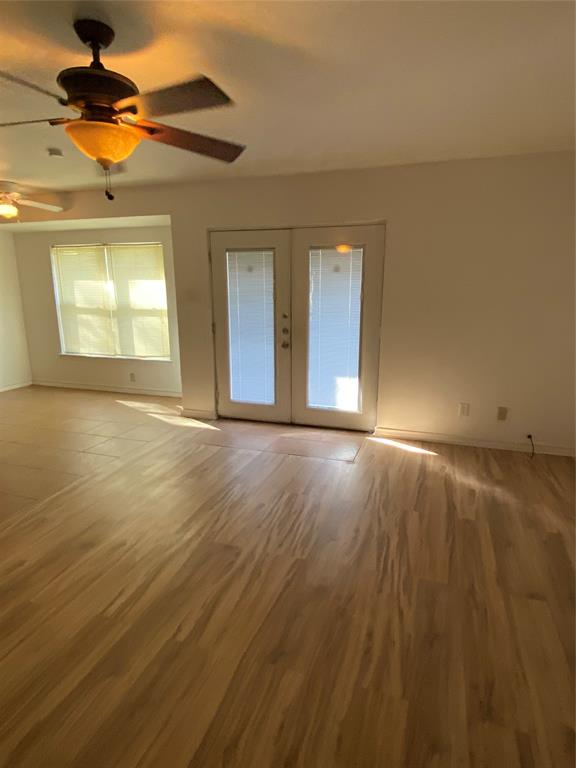 136 Richard Lane Azle, TX 76020 - Photo 10 of 13 a view of an empty room and window