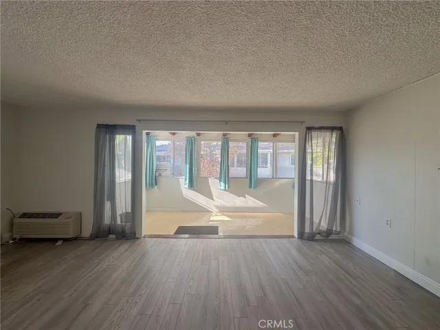 a view of hallway with windows