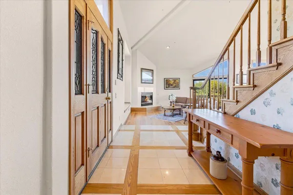 a view of a living room and dining room