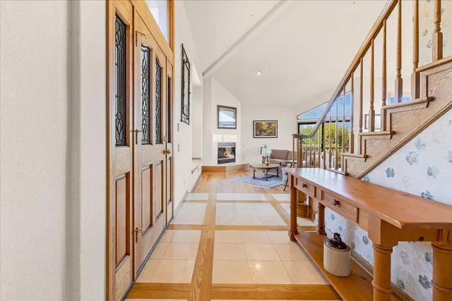 a view of a living room and dining room