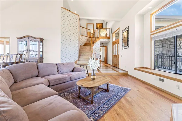 a kitchen with stainless steel appliances granite countertop a sink and cabinets