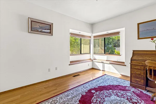 a bathroom with a shower and a toilet