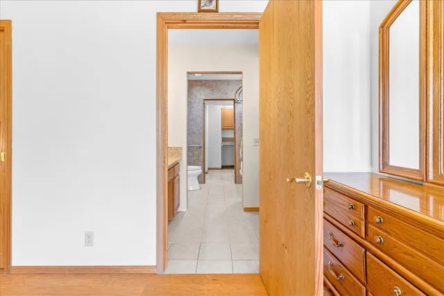 a view of a street with a back yard