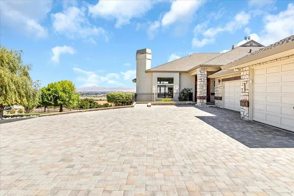 a view of an entryway with wooden floor and windows