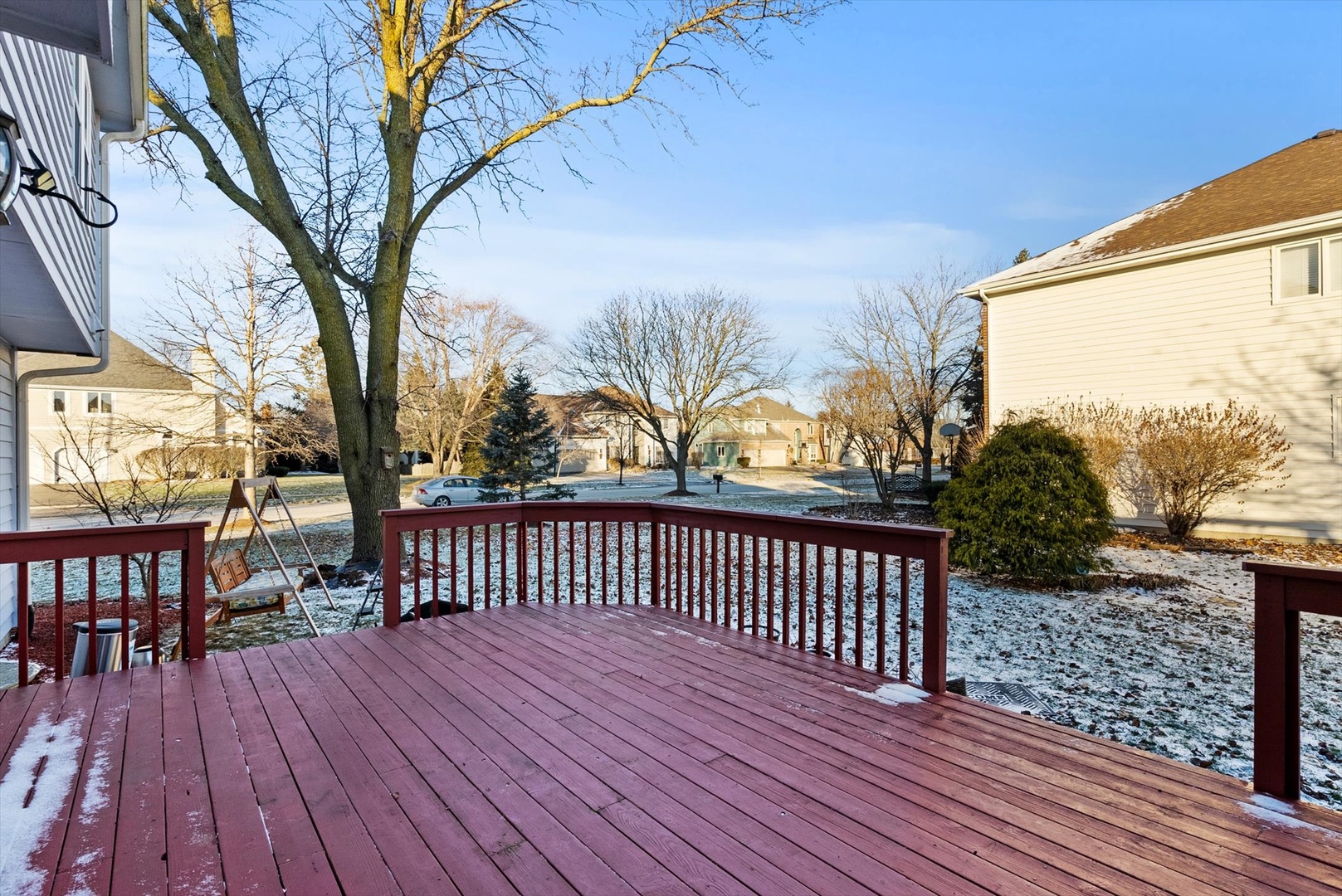 1107 Conan Doyle Road Naperville, IL 60564 - Photo 29 of 34 a view of a wooden chairs on the roof deck