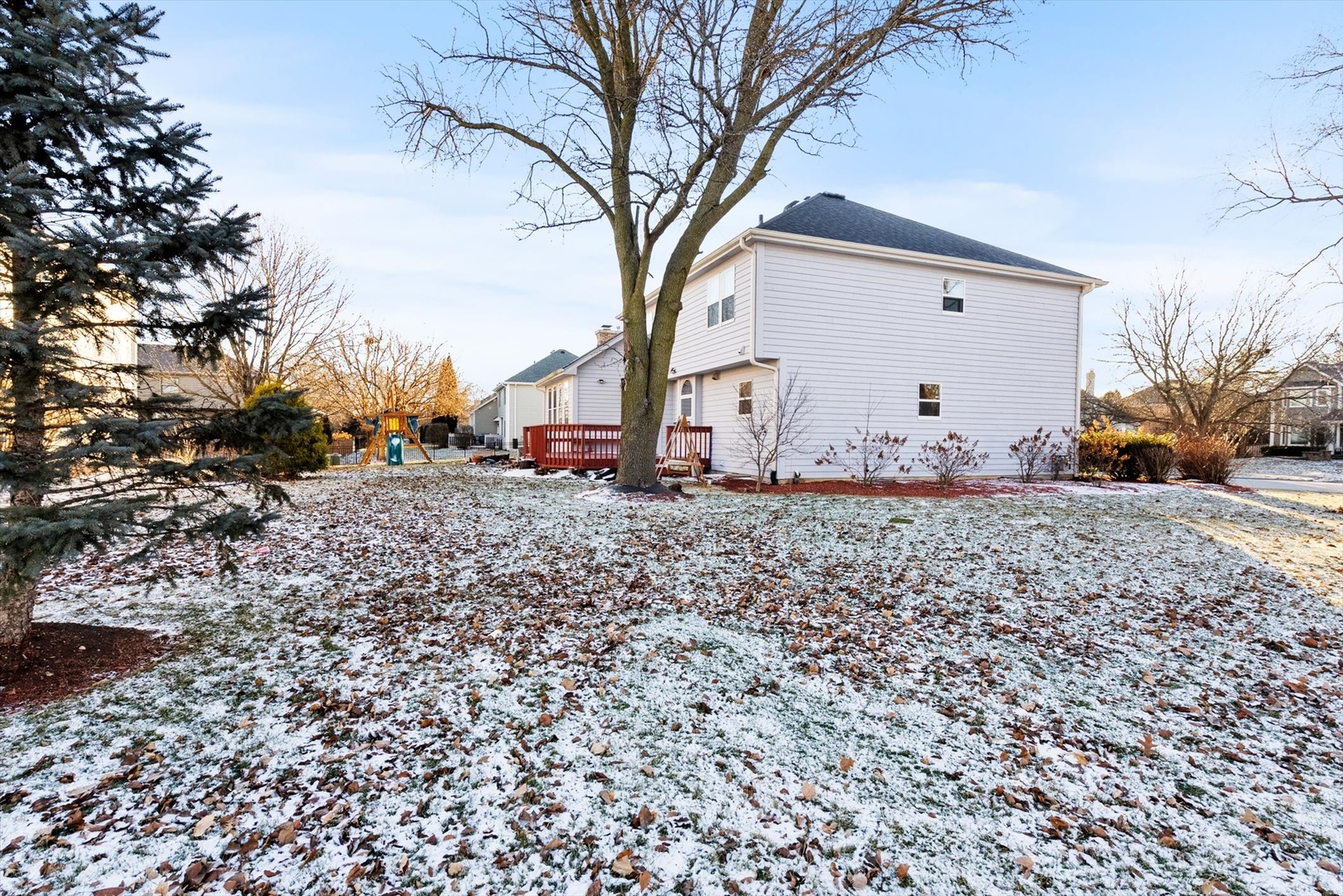 1107 Conan Doyle Road Naperville, IL 60564 - Photo 30 of 34 a backyard of a house with lots of green space