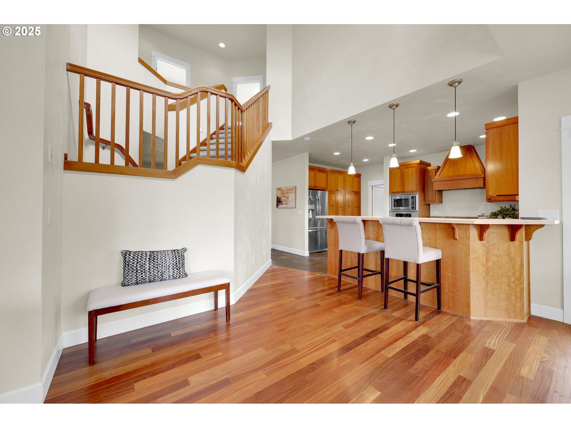360 Mountaingate Drive Springfield, OR 97478 - Photo 9 of 48 a view of entryway dining room and hall with wooden floor