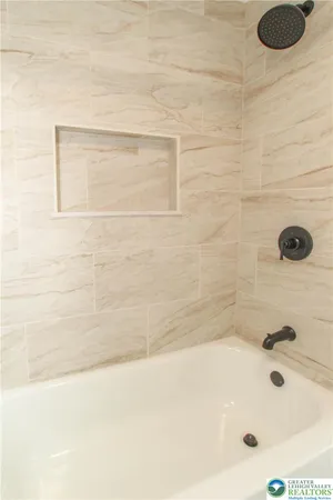 a bathroom with a tub