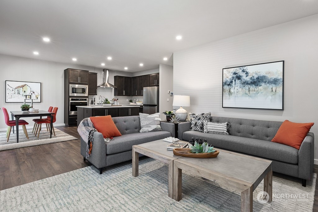 126 177th Street Southeast Bothell, WA 98012 - Photo 13 of 30 a living room with furniture and a wooden floor