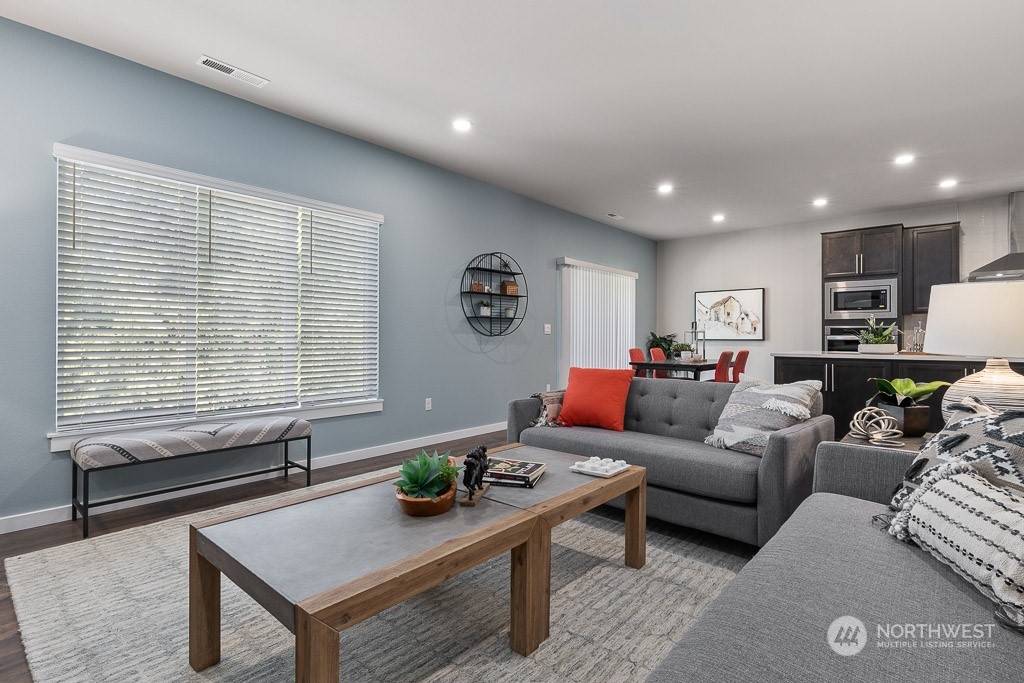 126 177th Street Southeast Bothell, WA 98012 - Photo 14 of 30 a living room with furniture and a window