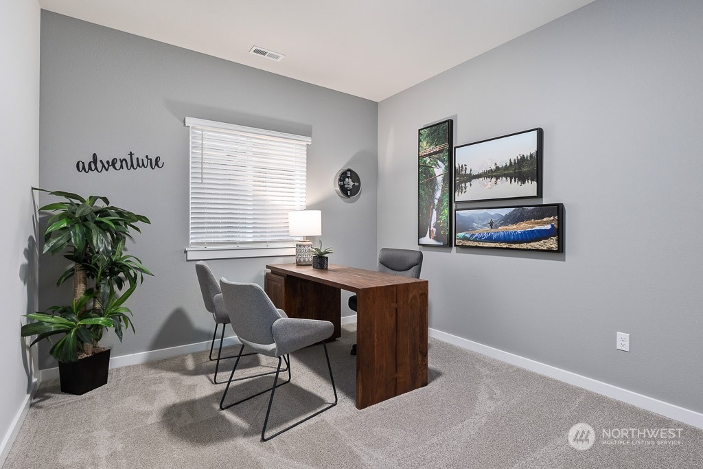 126 177th Street Southeast Bothell, WA 98012 - Photo 5 of 30 a workspace with furniture and window