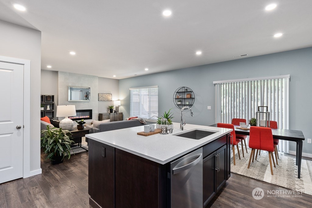 126 177th Street Southeast Bothell, WA 98012 - Photo 9 of 30 a kitchen that has a table and chairs in it