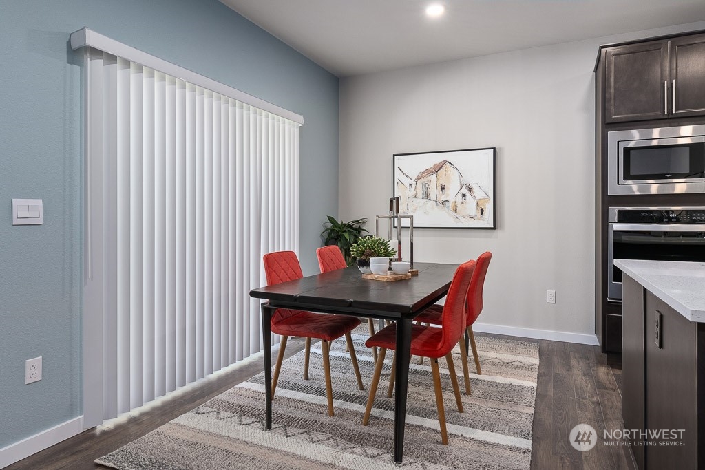 126 177th Street Southeast Bothell, WA 98012 - Photo 10 of 30 a view of a dining room with furniture