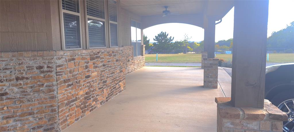 1301 Old Dicey Road, Unit 443 Weatherford, TX 76085 - Photo 3 of 11 a view of a livingroom with furniture and door