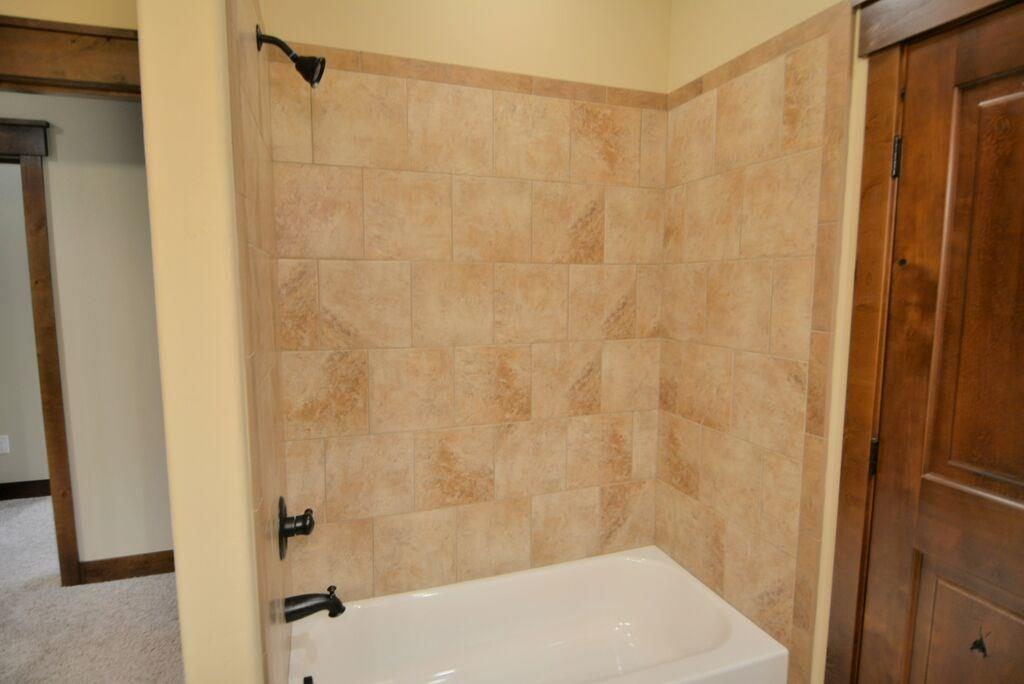 721 Independence Road, Unit 13A Keystone, CO 80435 - Photo 13 of 25 a bathroom with a shower curtain and a sink