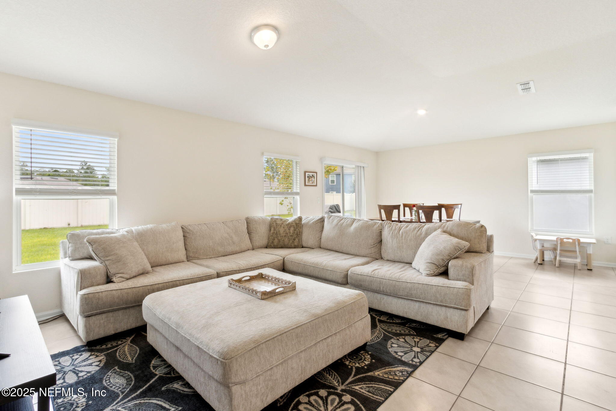 86256 Express Court Yulee, FL 32097 - Photo 4 of 27 Family Room and Dining Area