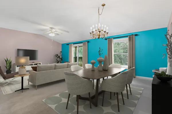 a view of a dining room with furniture window and outside view