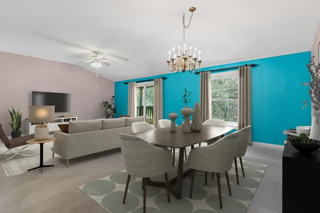 a view of a dining room with furniture window and outside view