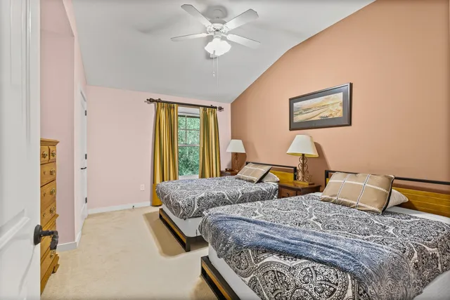 a view of a hallway with wooden shelves