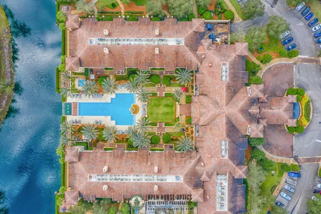 an aerial view of a house with a garden