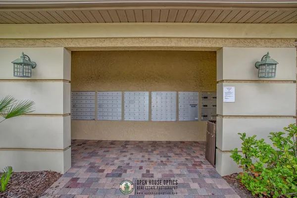 a view of a chairs and table in a patio