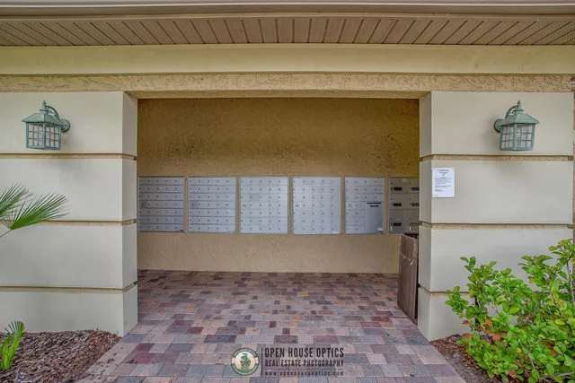 a view of a chairs and table in a patio