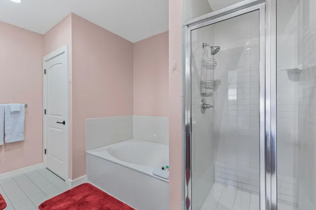 a view of a patio with a table and chairs