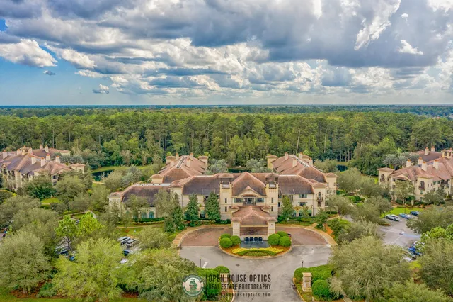 a view of a golf course with a lake