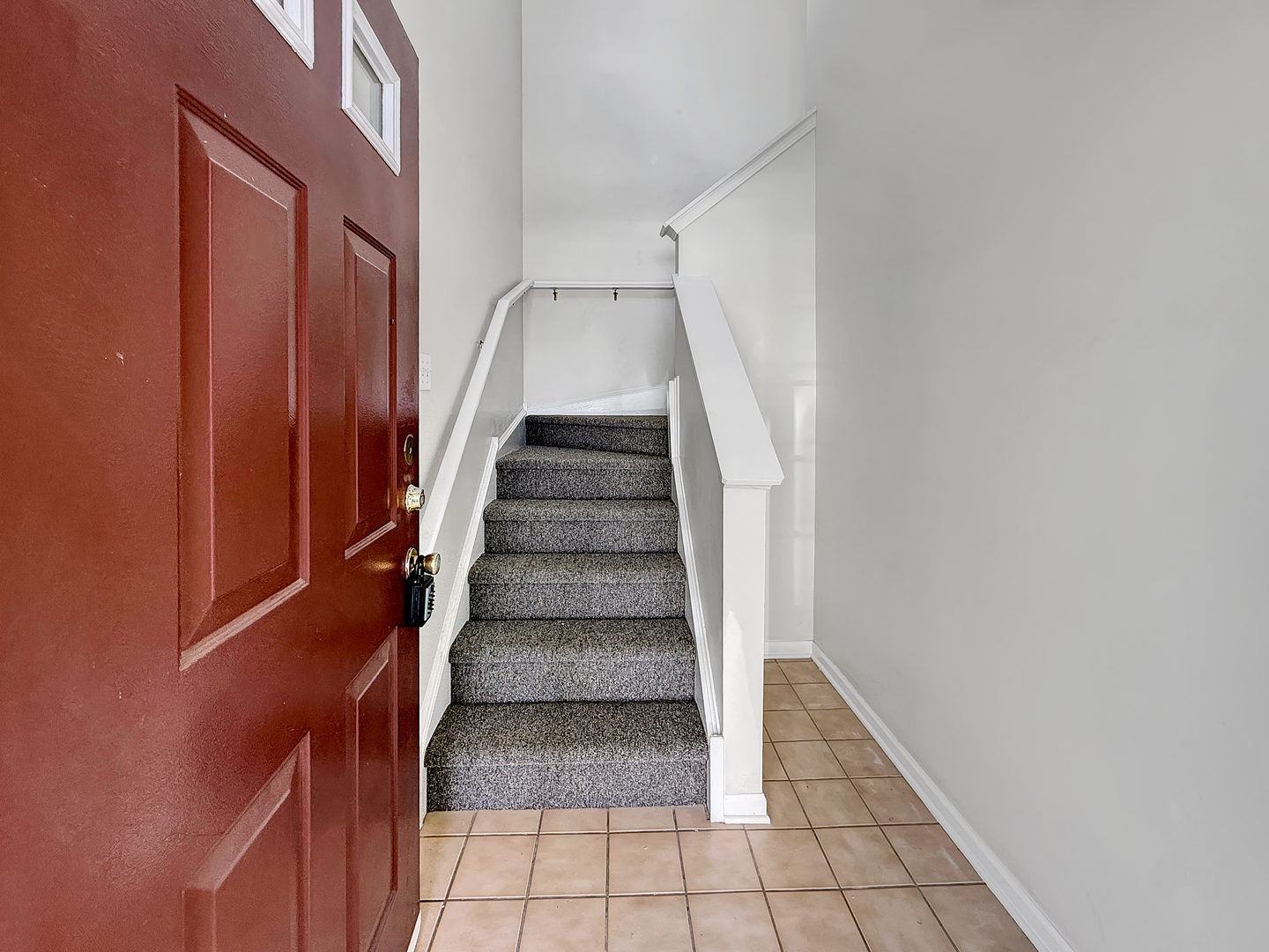 3078 Falling Waters Lane, Unit 3078 Lindenhurst, IL 60046 - Photo 3 of 19 a view of entryway and hall with wooden floor