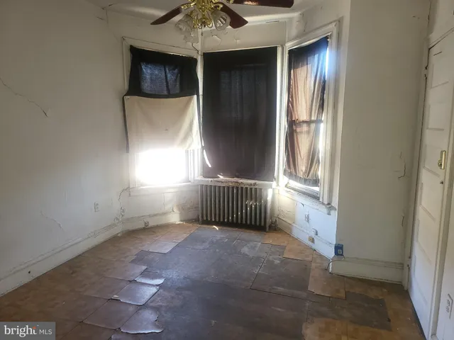 an empty room with windows