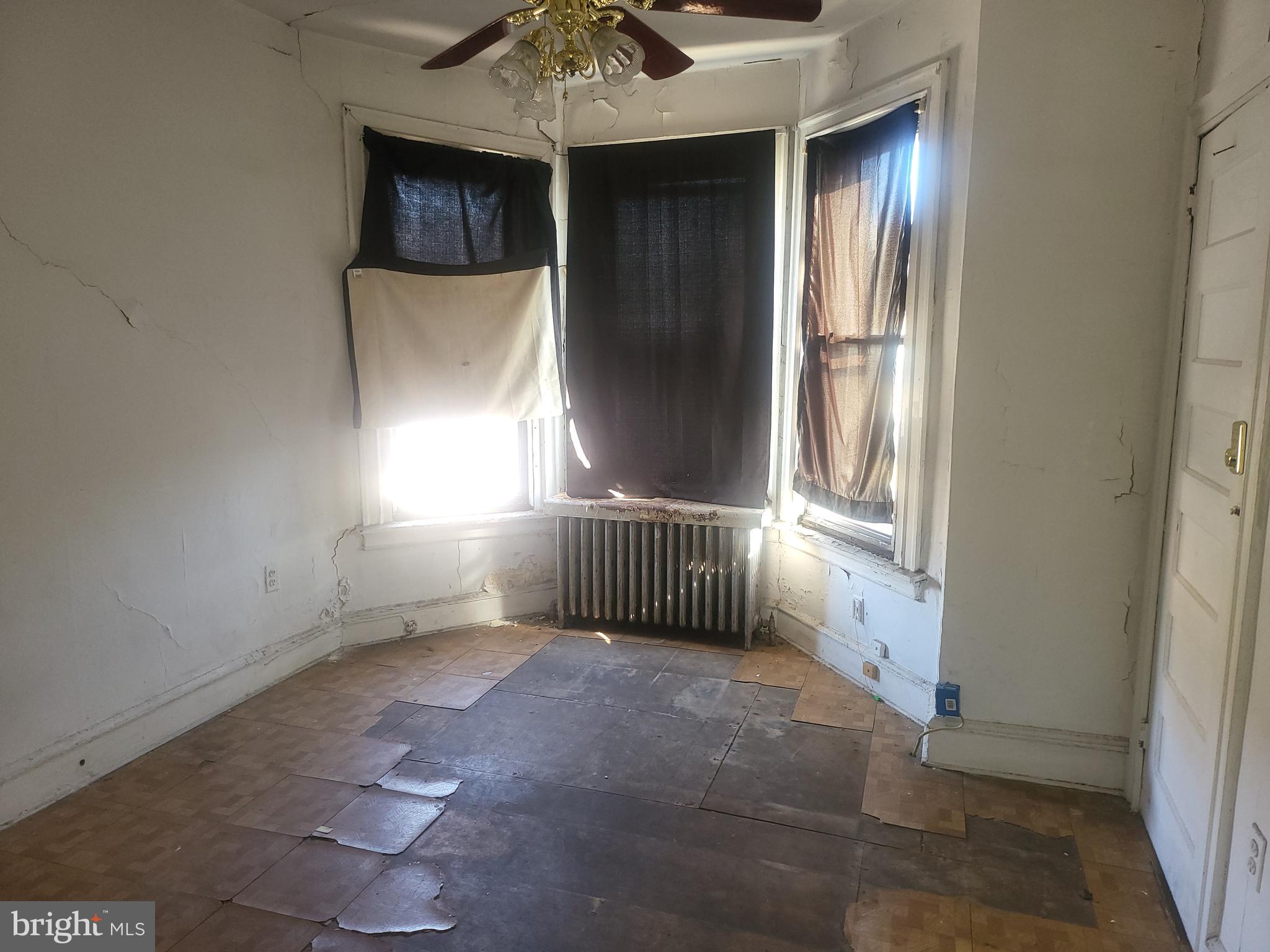 5700 Delancey Street Philadelphia, PA 19143 - Photo 8 of 12 an empty room with windows