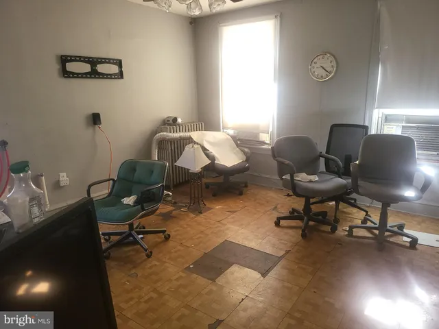 a workspace with furniture and a window