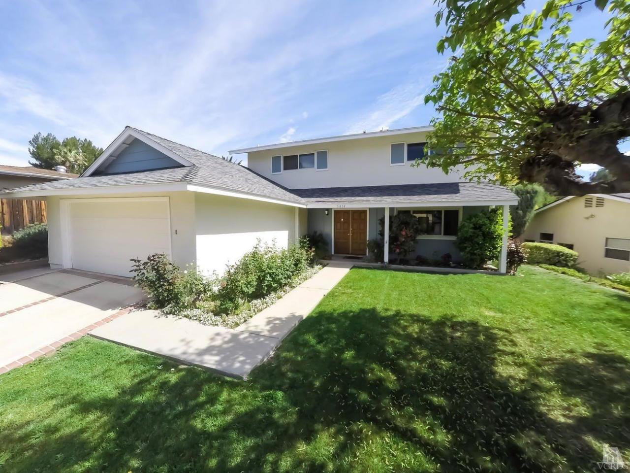 5414 Parkmor Road Calabasas, CA 91302 - Photo 2 of 58 a front view of a house with a yard