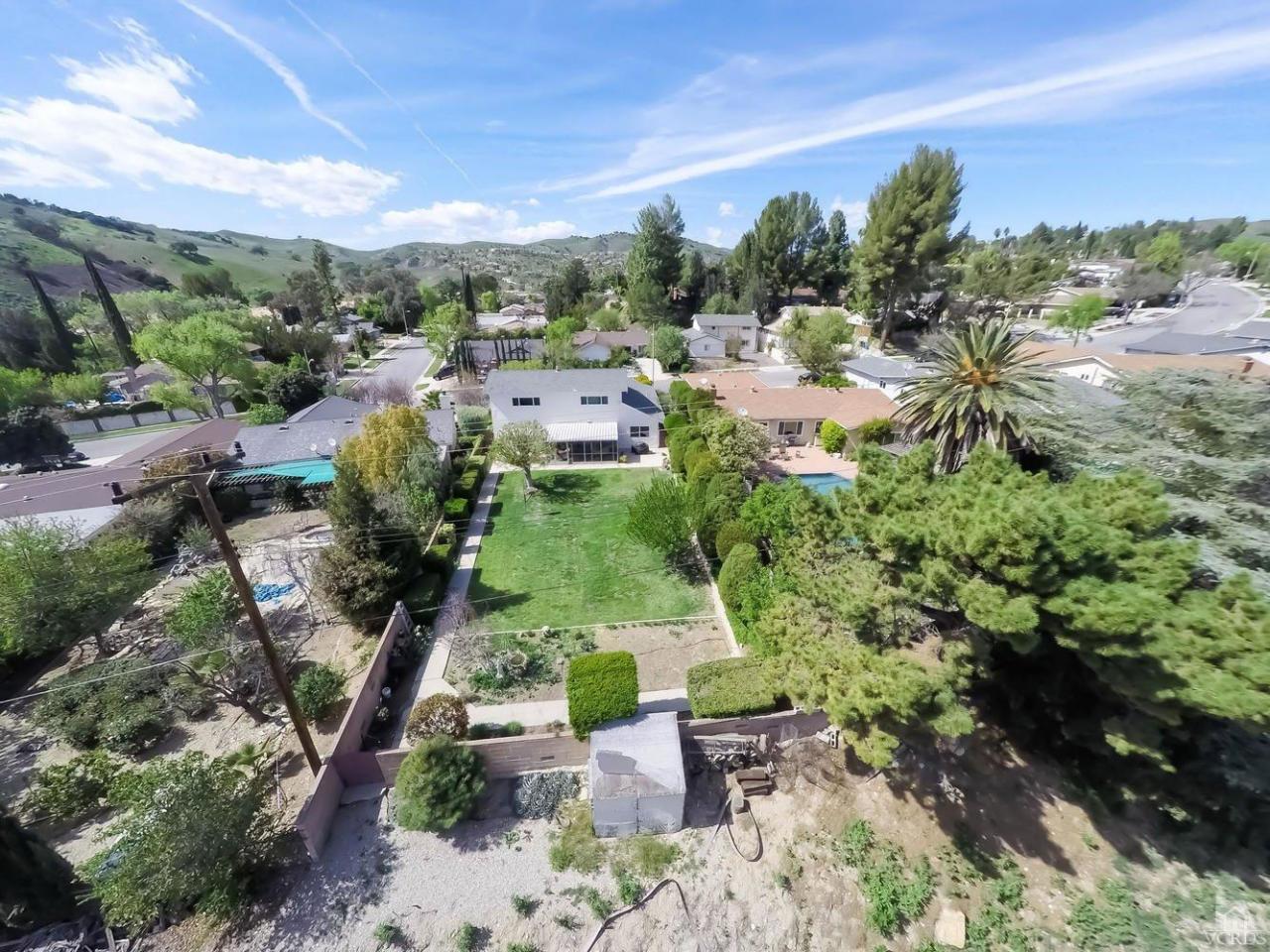 5414 Parkmor Road Calabasas, CA 91302 - Photo 11 of 58 a view of a garden with lawn chairs