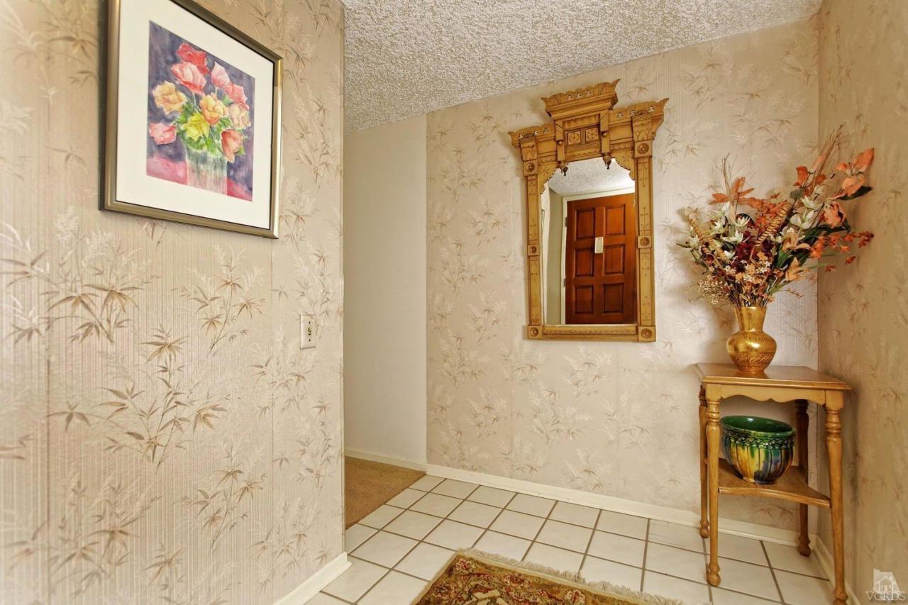 5414 Parkmor Road Calabasas, CA 91302 - Photo 18 of 58 a view of a hallway with a flower pot
